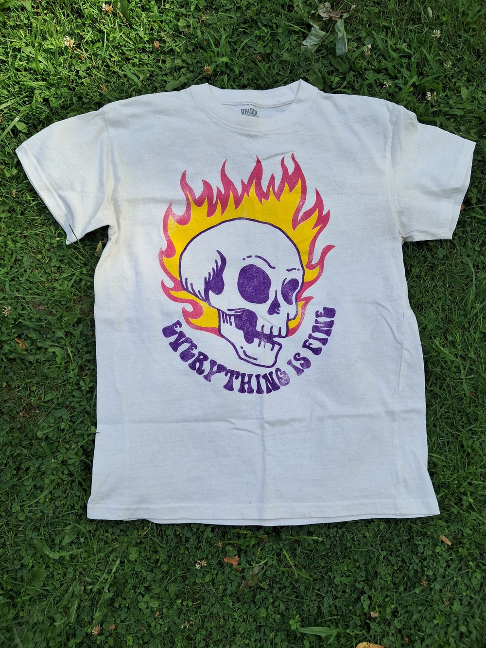 Everything Is Fine Skull Graphic Tee in White with Yellow & Purple